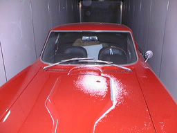 Snow on her hood, locked in a freezing trailer 2000 miles from where she has lived her whole life - doesn't she looked pissed?