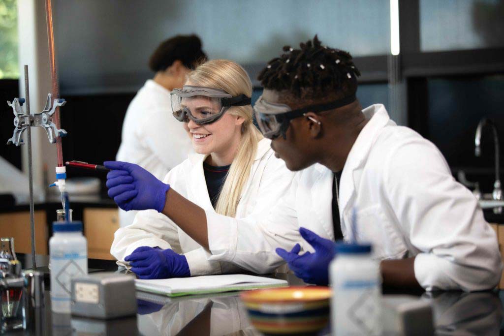 An image of students in a chemistry lab.
