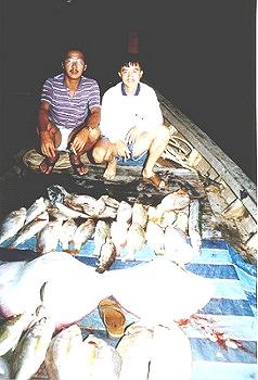 Photo Gallery of Fishing Around Singapore Angler Hotspots - Jack and me with some of this mix fish caught in Pengarang South of Johor.
