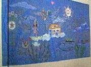 Mural no Lar das Meninas. Pintou motivos infantis retirados de trabalhos feitos pelas meninas do Lar.