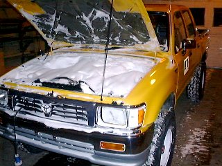 Snow under bonnet of vehicle