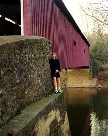 Bryan on a covered bridge
