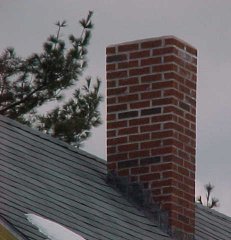 photo of a brick chimney on a home