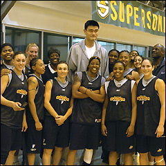 Seattle Storm pose with Houston Rockets center Yao Ming