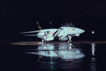 VF-32: Parked on the tarmac after a recent rain.