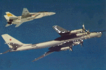VF-32: Tomcat escorting a Russian Bear D Bomber. Nov. 1976.