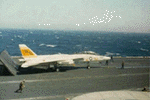 VF-32: F-14 ready for launch on waist cat of USS JFK. circa 1975