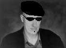headshot thumbnail with shades, beret, and soulpatch.  groovy man.