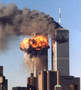 The twin towers of New York's World Trade Center 
ablaze after being hit by crashed airliners, September 11, 2001.
President Vinsangh sent condolences to New Yorkers, and urged calm.