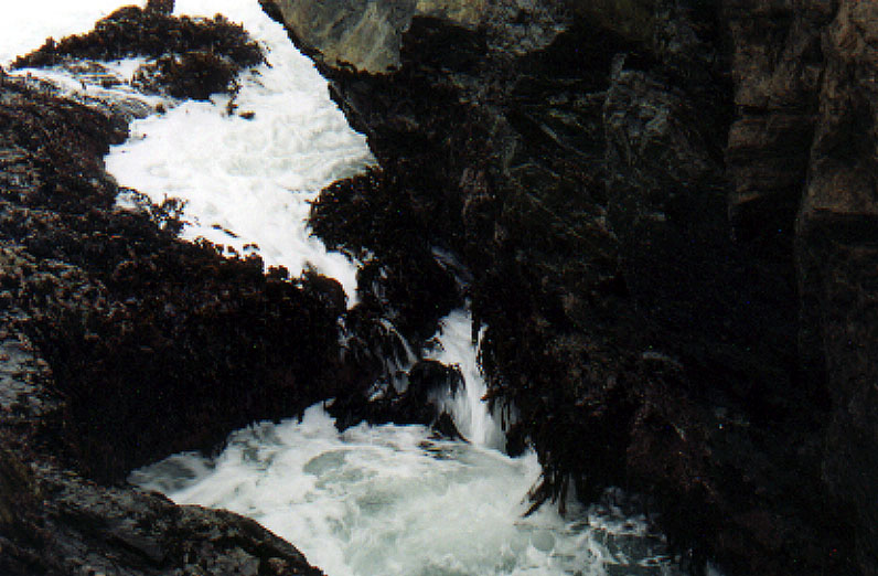 Tides cut between the rocks.