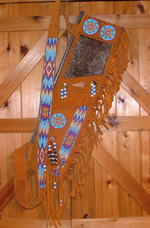 Plains Quiver with rabbit hair, abalone buttons, medicine bag.
