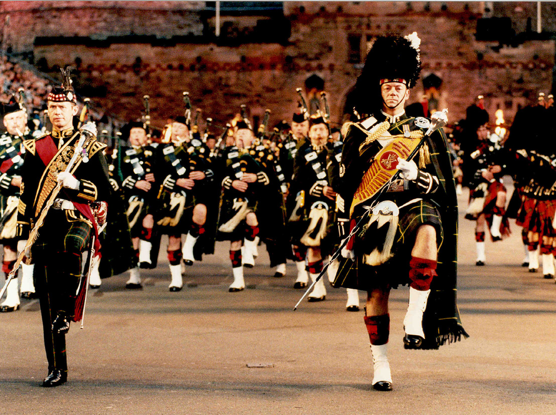 [Our good pipers are in the front and I am in behind them]