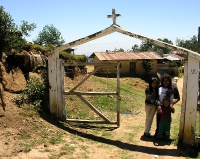 Maidita with a niece and nephew outside the town cemetery