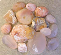 Sample photo (actual colors and no touch up on any of these photos) of rough and polished very RARE pink agates as found on the beach at Newport over many years of collecting!