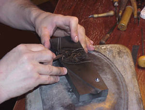 The process of engraving into slate