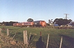 A train from Sale to Melbourne passes Wurruk