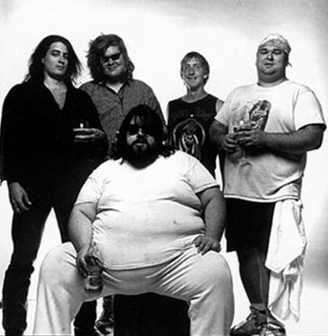 Tom Pig (sitting) with Poison Idea 1988