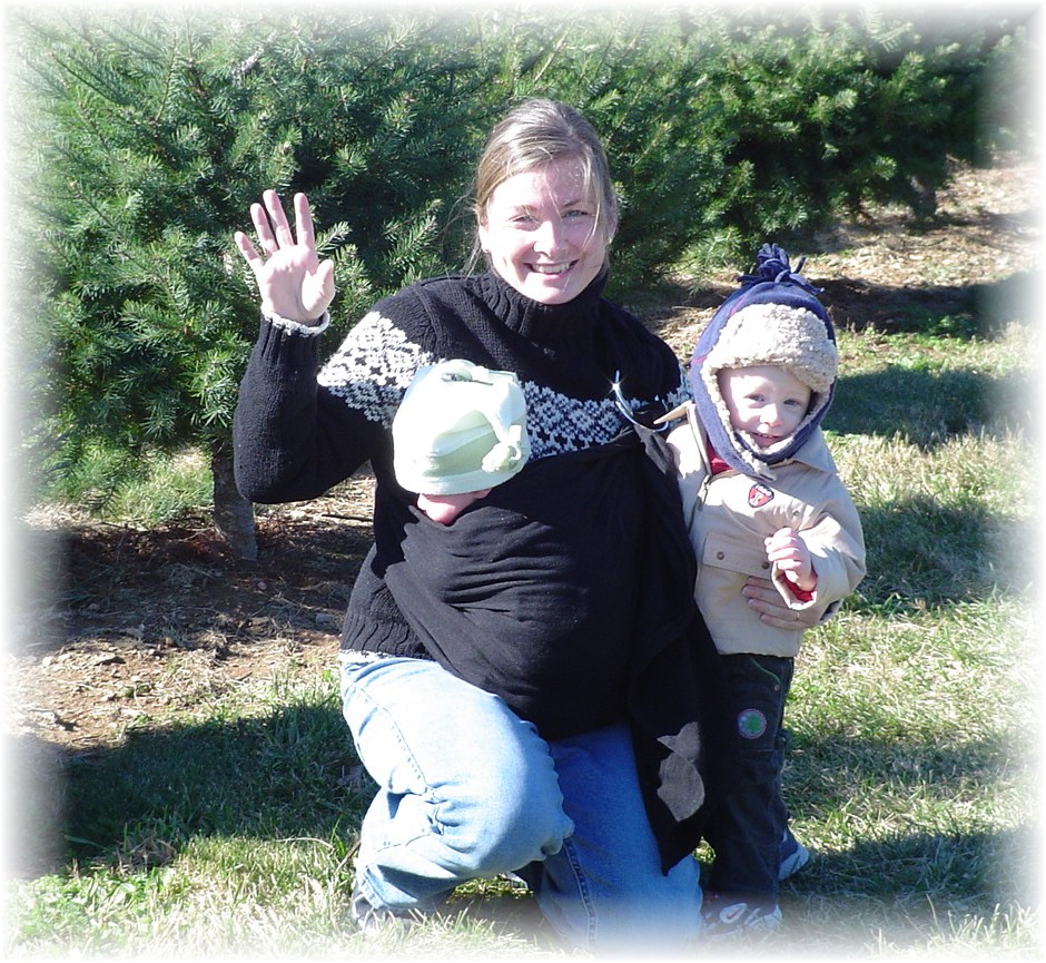 Mommy and sons at the Christmas tree farm