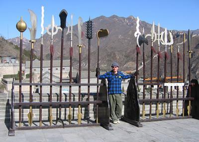 Jason Faux (webmaster) with traditional Chinese polearms at the Great Wall of China