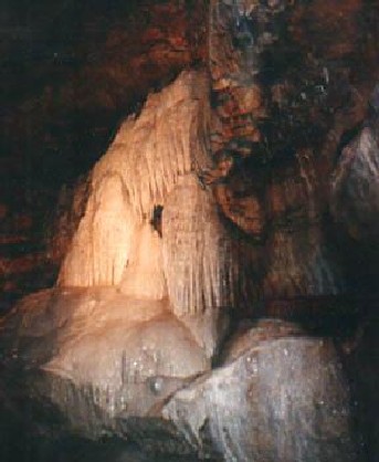 Pristine, seemingly glacial sculpture of deposited minerals in an Arkansas cavern.