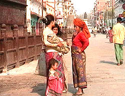 women talking on the street