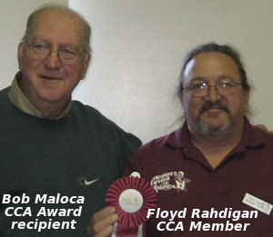 Bob Maloca receiving award