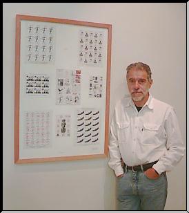 Clemente Padin with his work.