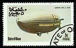The U.S. navy airship AKRON is shown on this stamp from Dhufar.