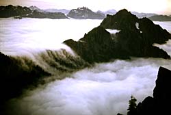 Mountains and clouds. Photo copyrighted. Courtesy Eden Communications.