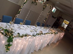 Head Table....decorating by Edna Lidstone, Botwood 709-257-4599
 