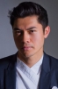 photo Henry Golding (voz)